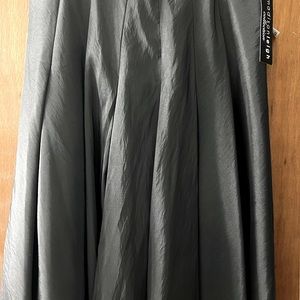 Black hidden pleat knee length skirt, never worn